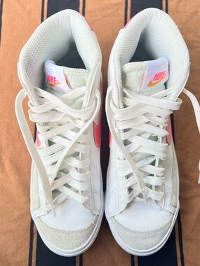 Nike White High-Top Sneakers with Pink and Orange Accents